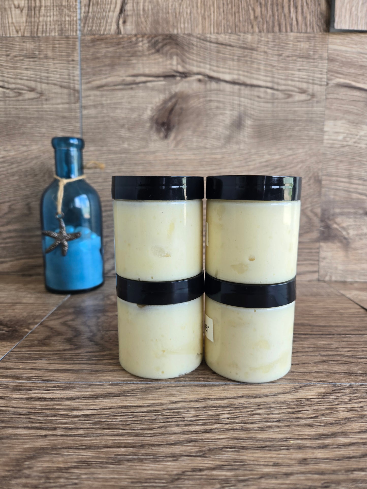 Creamy Body Butter infused in Ouch Be Gone pain relief oil.