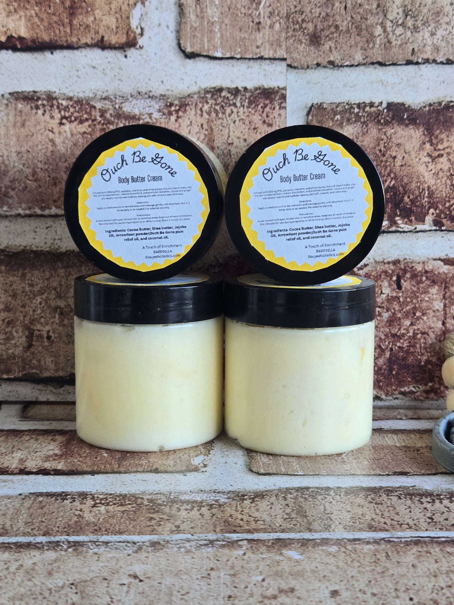 Creamy Body Butter infused in Ouch Be Gone pain relief oil.